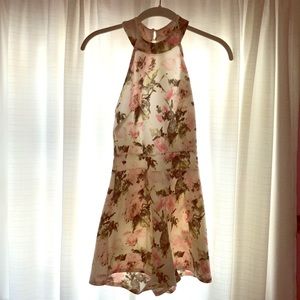 Junior jumpsuit. Multi color floral pattern